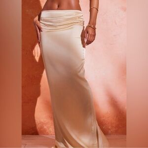 Cream/gold maxi skirt pretty little thing.